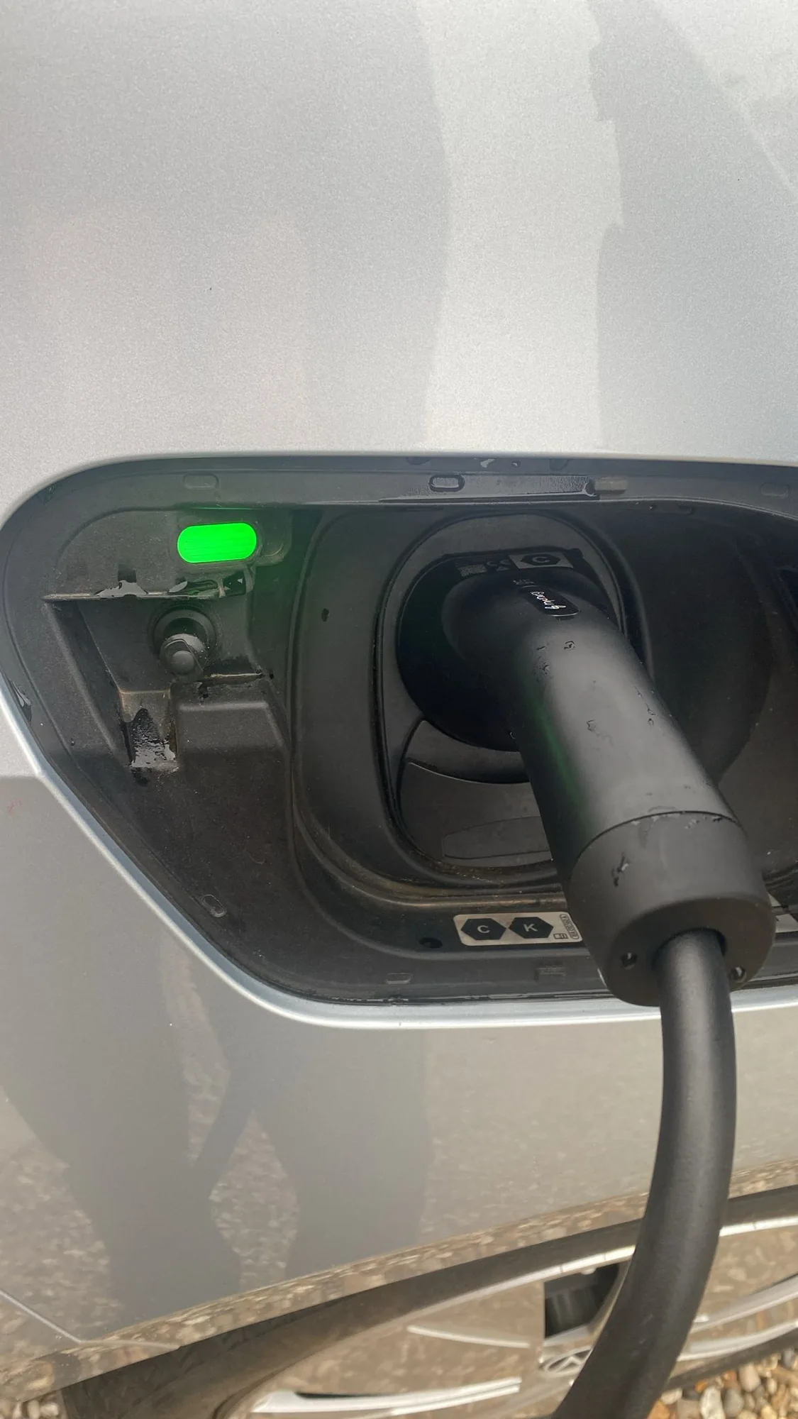 EV charger cable run kept tidy down an external wall